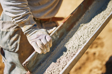 Construction worker on a heavy site doing hard work.