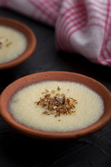 phirni - sweet rice pudding - traditional punjabi sweet dish in earthen plate