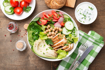 Salad with chicken meat. Fresh vegetable salad with chicken breast.