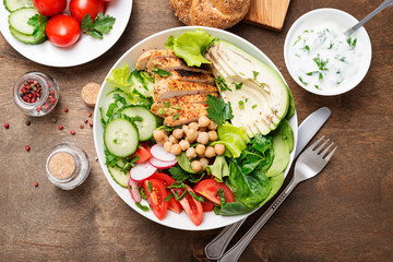 Salad with chicken meat. Fresh vegetable salad with chicken breast.