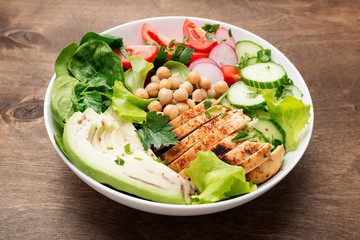 Salad with chicken meat. Fresh vegetable salad with chicken breast.