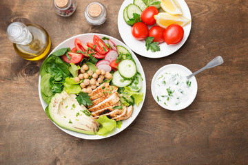 Salad with chicken meat. Fresh vegetable salad with chicken breast.