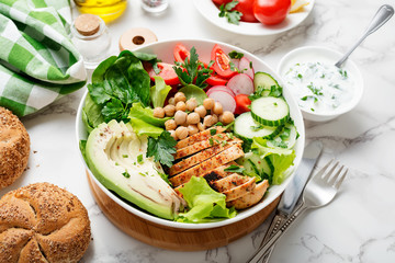 Salad with chicken meat. Fresh vegetable salad with chicken breast.