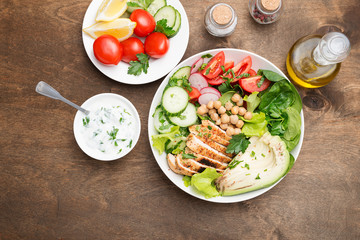 Salad with chicken meat. Fresh vegetable salad with chicken breast.