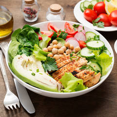 Salad with chicken meat. Fresh vegetable salad with chicken breast.