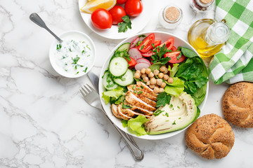 Salad with chicken meat. Fresh vegetable salad with chicken breast.