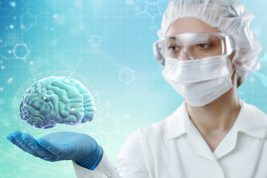 Doctor shows the brain of a person on a blue background. Modern medical and scientific concept.