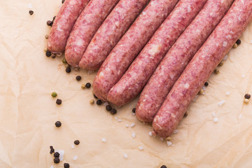 food, delicious and serving concept - sausages, top view