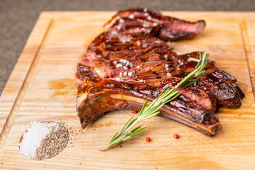 Food, delicious, horse meat and craft concept - serving of grilled steak