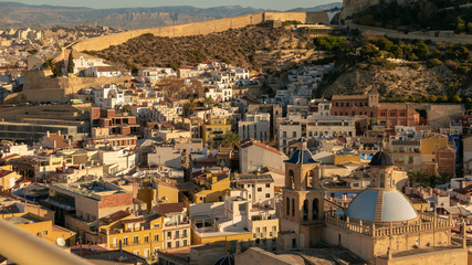 Fototapeta premium aerial view of the neighborhood of Santa Cruz and the co-cathedral of San Nicolas in Alicante
