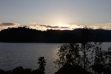 Fototapeta premium Sunsets over a tropical island