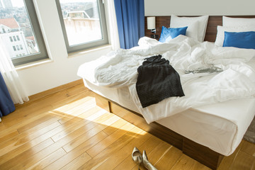 Fototapeta na wymiar Morning in a hotel bedroom