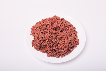 Top view of raw minced beef meat isolated on white