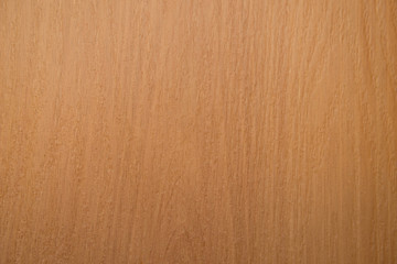walnut-colored wooden surface with stripes and irregularities