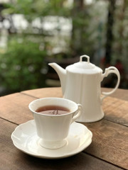 White coffee cup on wooden table