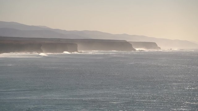 Coastline with a steep coast and the Atlantic Ocean, El Cotillo, Fuerteventura, Spain