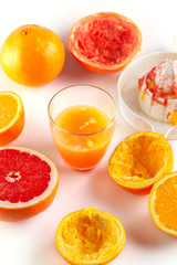Fototapeta na wymiar freshly squeezed citrus juice. Orange and grapefruit