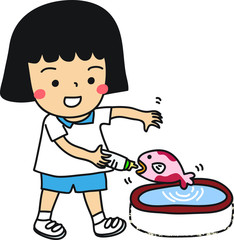little girl feeds fish