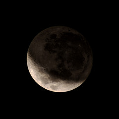 Fototapeta premium Waxing Crescent Moon with detail in shadow