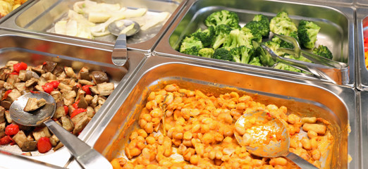 raw and cooked vegetable in the trays