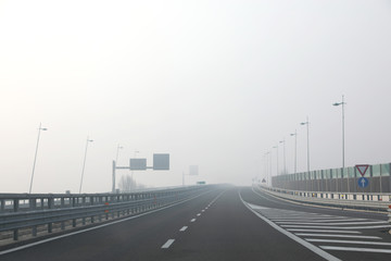 junction of the highway with very dense dangerous fog