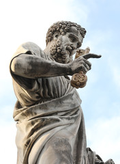 ancient Statue of Saint Peter with beard and the keys in in the