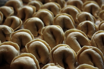 Obraz premium raw dumplings on the table
