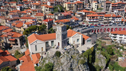 Fototapeta na wymiar Aerial drone photo from famous and picturesque village of Arachova built on the slope of Parnassus mountain with traditional character at spring, Voiotia, Greece