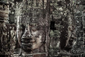 Smiling Faces of Bayon temple in Angkor Thom ancient ruin near Angkor Wat, Siem Reap, Cambodia. One of the most magnificent lost civilization in the world.