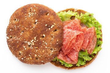 Sandwich with ham sausage on white background.