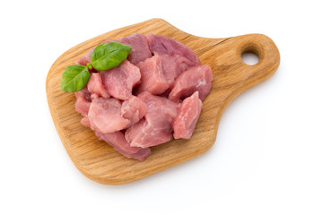 Raw chopped beef meat pieces isolated om white background cut out.
