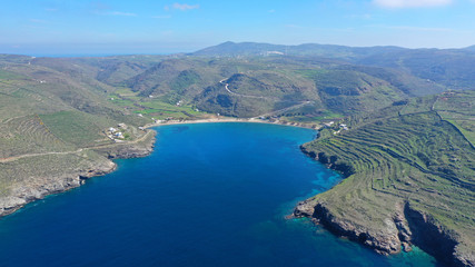 Obraz premium Aerial drone panoramic photo of iconic two sided sandy tropical turquoise sea paradise beach of Kolones near Fykiada in island of Kythnos at spring, Cyclades, Greece