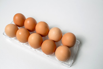 Close up of chicken eggs over white background