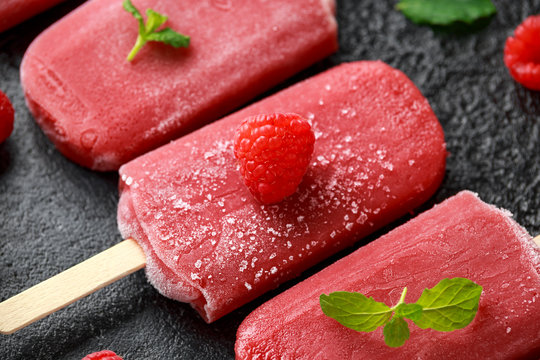 Homemade Raspberry Popsicles, Ice Lolly On Rustic Black Background