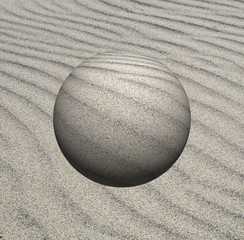 Obraz premium stone in sand on background