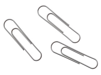 Three silver paper clips isolated on a white background. Top view.