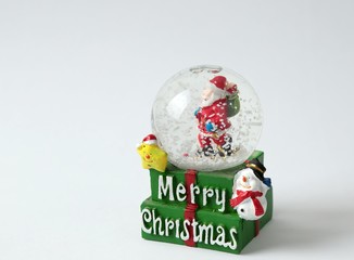 New Year snow globes on white background.