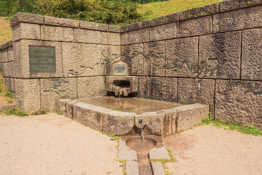 The Moselle coming from under the ground at its source on the Col de Bussang