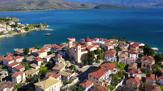 Aerial drone video from famous picturesque and traditional marine village of Galaxidi with unique character, Fokida, Greece