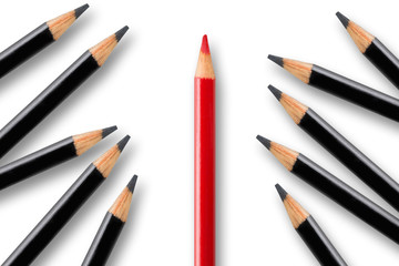 Business concept of disruption, leadership or think different; red pencil dividing group of black pencils