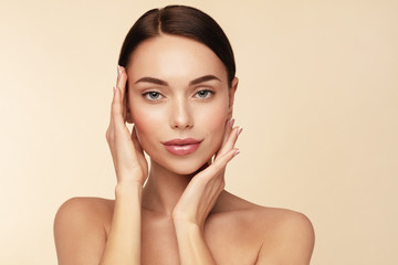 Skin care,Beauty treatment and spa concept. Attractive model with brown hair and  Clean Fresh Skin...