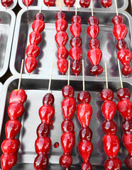 caramelized red strawberries in the steel tray