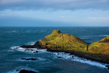 Green cliff in the oceans
