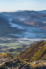 The view down toward Thirlmere from Blencathra with low lying cloud mist, Lake District, Cumbria