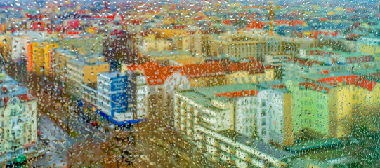 rain outside the window - view of the city