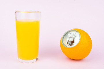 Orange juice on pink background
