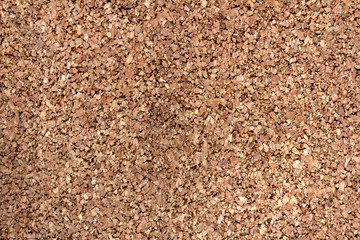 Seamless brown cork board texture or background