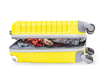 Isolated open suitcase with lots of clothes inside