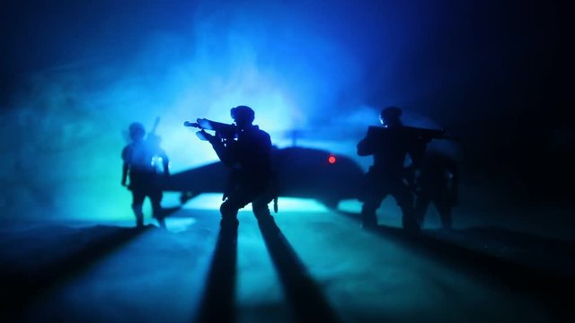 Artwork decoration. Soldiers in the desert during the military operation with combat helicopter or Helicopter assault special forces. Selective focus