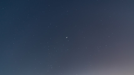 Fototapeta na wymiar starry sky and crescent moon